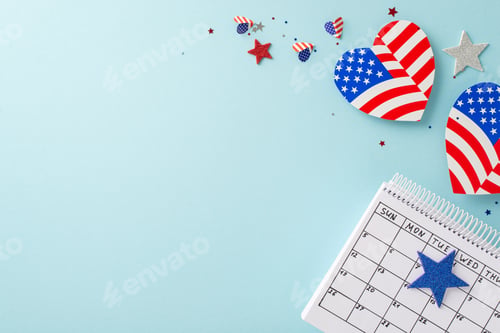 Preview: Fourth of July preparations: top view of symbolic embellishments, calendar marking special date