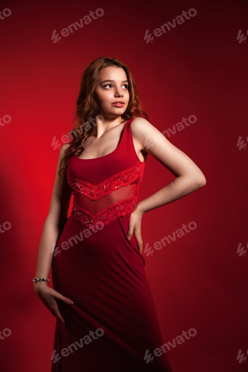 Preview: Lady in Scarlet Glows Underneath a Radiant Spotlight at Studio