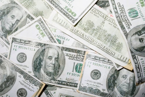 Preview: Crisp Hundred Dollar Bills Stacked in Organized Pile