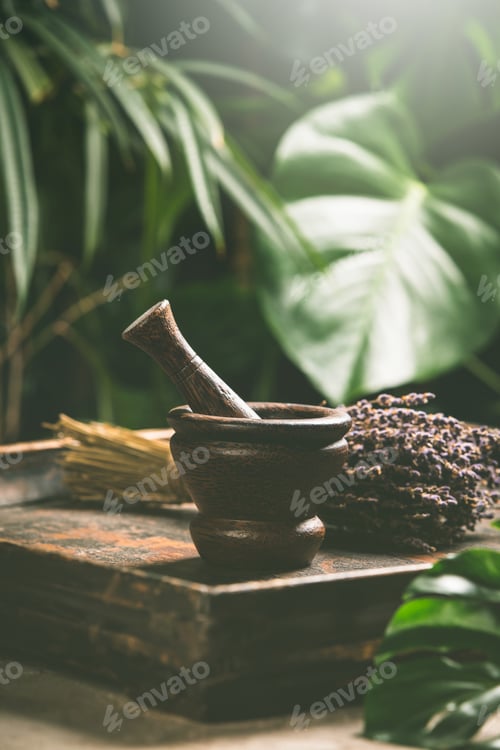 Preview: Mortar and pestle on tropical background, close up