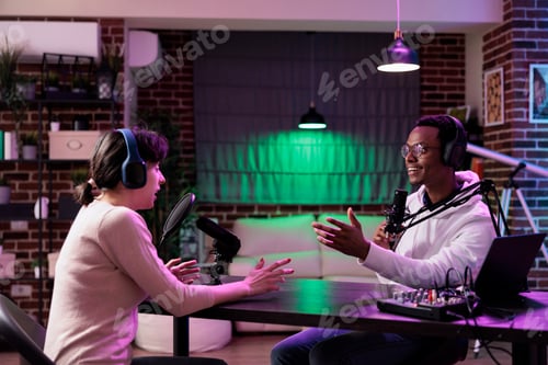 Preview: Diverse team of people working in studio to record podcast