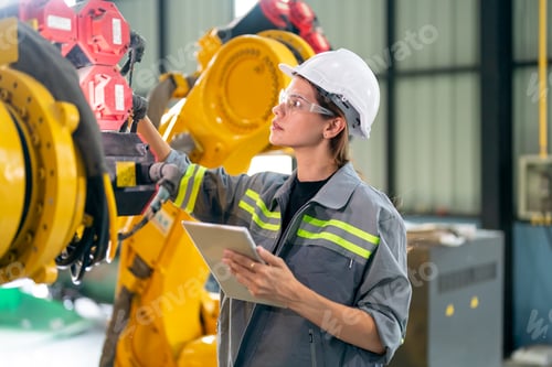 Preview: Technology Engineer's woman maintenance and check part of robotic machine