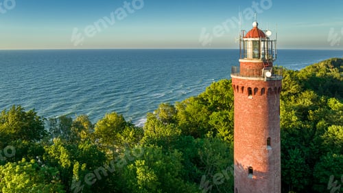 Preview: Lighthouse by Baltic sea in sunny day, Poland.