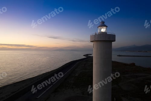 Preview: Aerial view of a maritime lighthouse taken at night