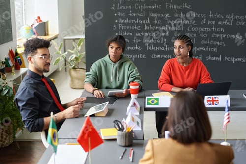 Preview: Students Listening to Male Teacher at School