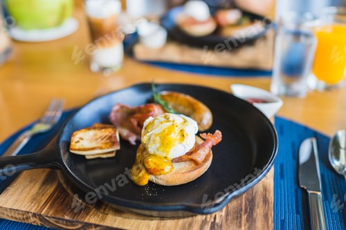 Preview: Breakfast set with egg benedict sausage in hot pan