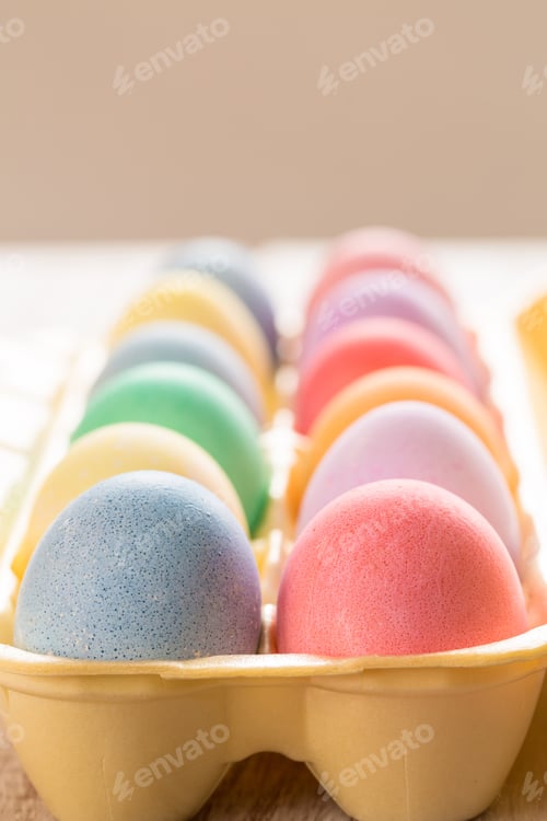 Preview: Close Up Of Colored Easter Eggs In Egg Carton