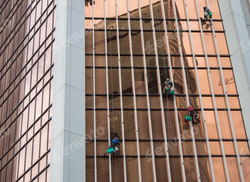 Preview: Washers wash the Windows of modern skyscraper, a dangerous job