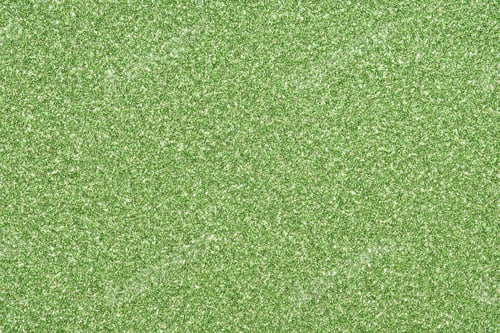 Preview: lime green sparkling glitter texture background.holiday festive backdrop.