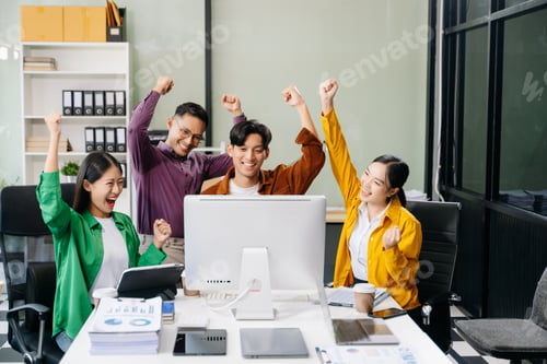 Preview: Happy businesspeople while collaborating on a new project in an office. Group of diverse