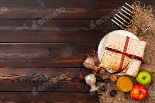 Preview: Jewish holiday Passover banner design with wine, matzo on wooden background.