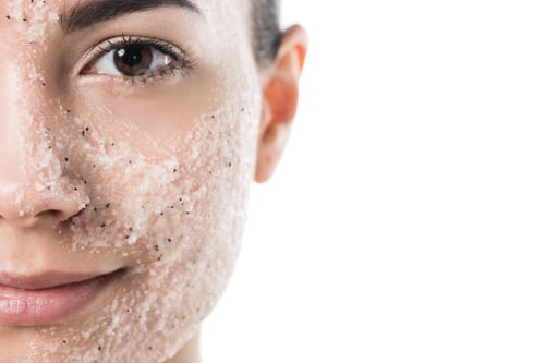 Preview: cropped image of beautiful girl with facial scrub looking at camera isolated on white