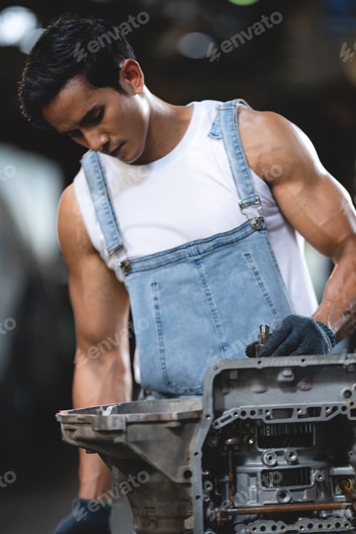 Preview: Vehicle automotive service guy worker doing check or mend car wheel, Asian mechanic repairman