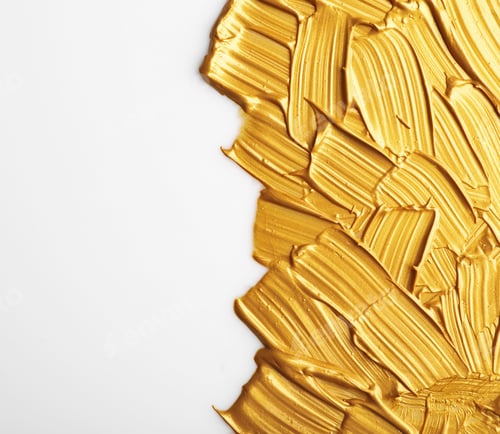 Preview: Strokes of gold paint isolated on white, top view