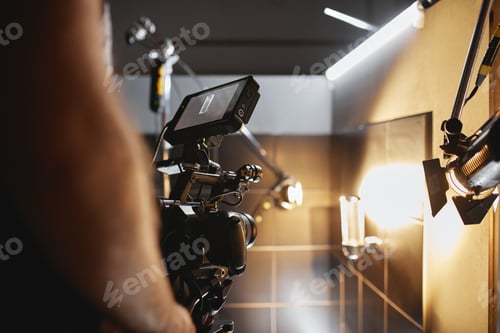 Preview: Professional Camera on Set With Lighting Equipment