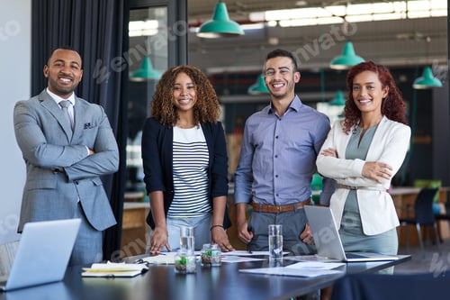 Preview: Cropped portrait of a group of young businesspeople standing in the boardroom