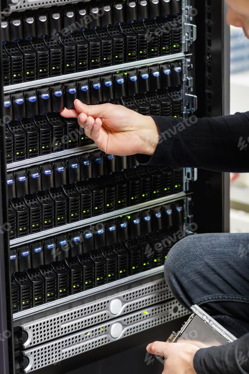 Preview: Male Technical Consultant Checking SAN array in Datacenter