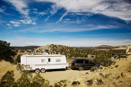 Preview: 53788,Car pulling trailer in desert landscape, Grand Staircase Escalante, Utah, United States