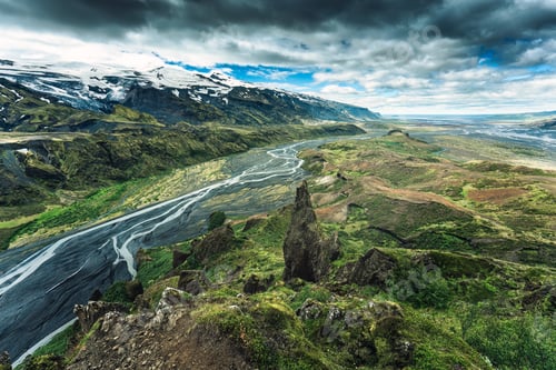 Preview: Valahnukur with lush volcanic mountain and moody sky in Icelandic highlands on summer at Thorsmork