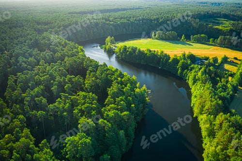 Preview: Turning river and forests at sunrise, aerial view