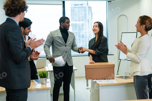 Preview: Beautiful young female carrying office box and hired for a new job.