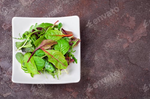 Preview: Fresh green salad with spinach,arugula, chard leaves, lettuce. Mixed salad leaves