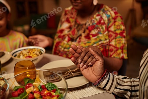 Preview: Family Members Praying Together