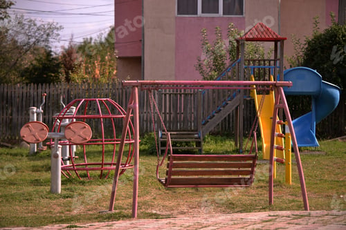 Preview: Playground for children on the yard of a primary school in a village