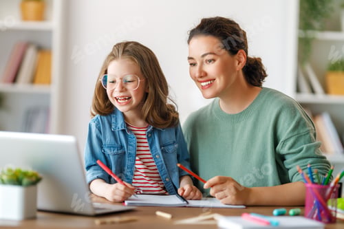 Preview: Girl doing homework or online education.