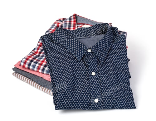 Preview: Stack of Folded Men's Button Down Shirts
