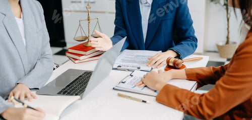 Preview: Two lawyers are discussing about contract paper, law matters determination, pointing.