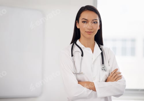 Preview: Shell sort you out. Portrait of a confident young doctor standing with her arms folded.
