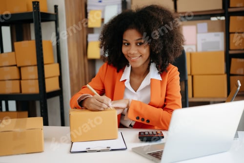 Preview: Startup small business SME, Entrepreneur owner African woman using smartphone or