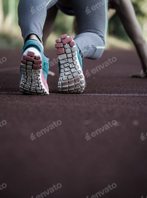Preview: sports girl on the treadmill ready to run, close-up