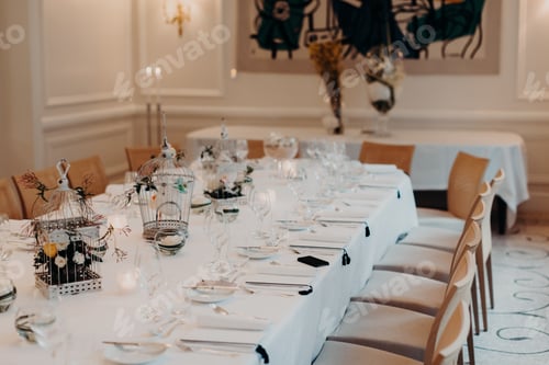 Preview: Beautifully decorated dining table for celebration in cafe or restaurant. White colours