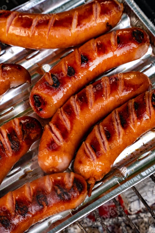Preview: Grilling Sausages on barbecue grill