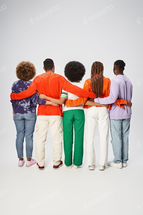 Preview: back view of african american people in casual attire hugging on grey backdrop, Juneteenth