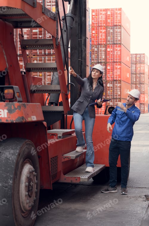 Preview: Container manufacturing manager and businesswomen survey the area to plan the storage