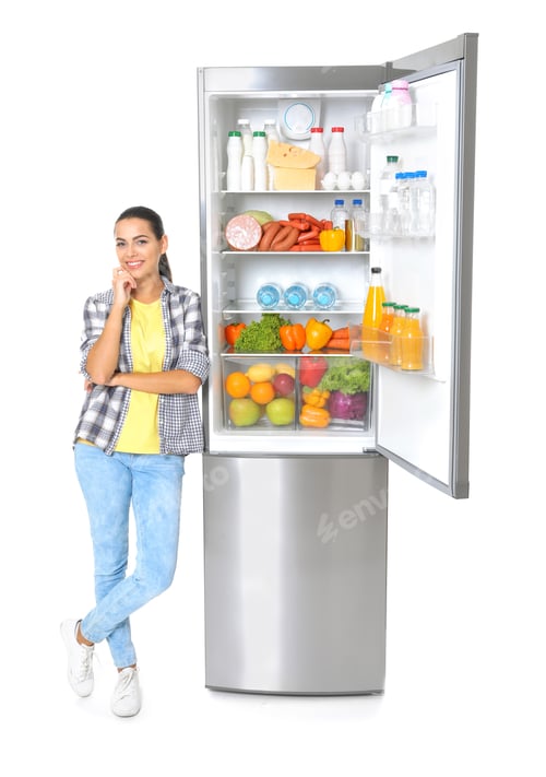 Preview: Young woman near open refrigerator on white background