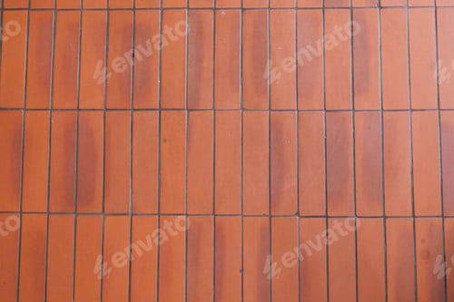 Preview: Floor made of orange terracotta tiles in a sunny setting