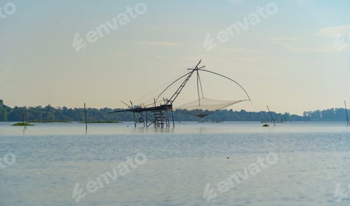 Preview: Fishing trap net in canal,lake or river. Nature landscape fisheries and fishing. Aquaculture farming