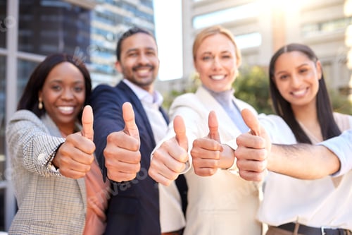 Preview: Shot of a group of businesspeople showing a thumbs up against a city background