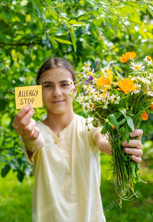 Preview: allergy to flowers in a child. Selective focus.