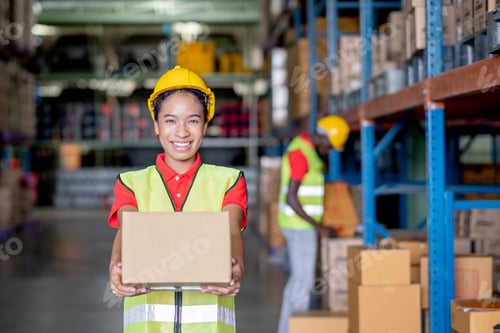 Preview: African American warehouse worker or factory woman hold box and action of give to camera