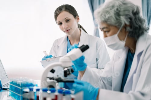 Preview: Scientist works with a pipette and a test tube.