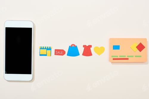 Preview: flat lay with credit card template near icons and smartphone on white background