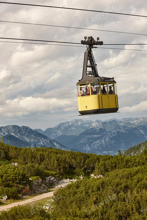 Preview: Picturesque yellow cable car in Dachstein mountain range. Austria