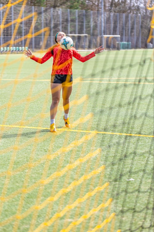Preview: Girl on the soccer field. Soccer training. Active lifestyle. Football concept.