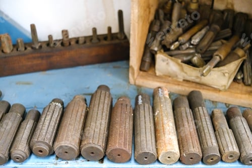 Preview: Metal chisels for working brass in an artisan factory of metal parts.