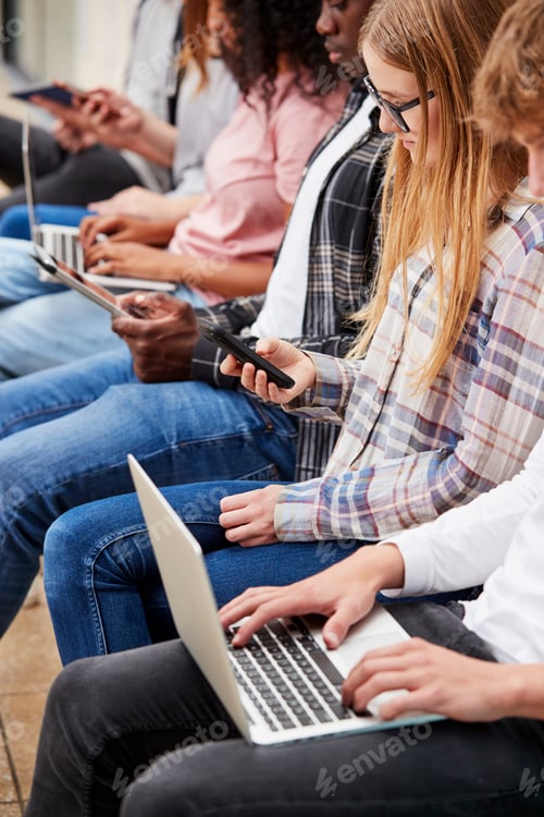 Preview: Close Up Of Seated College Students Using Digital Technology